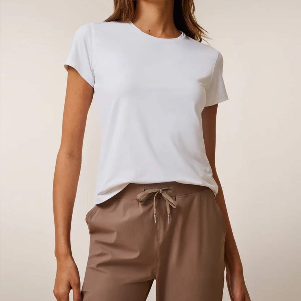 White athletic golf tee